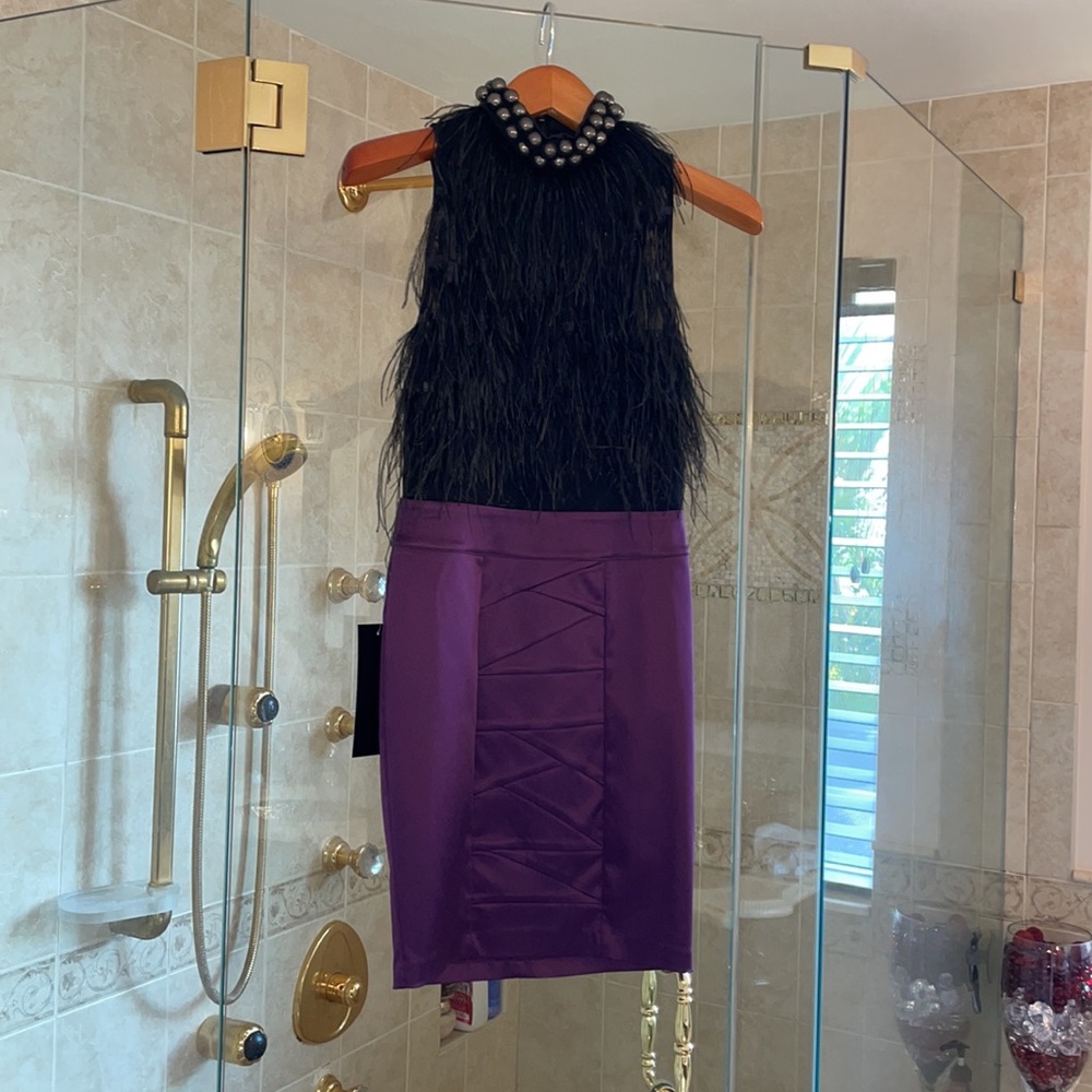 Brand new Bebe silk/real feather dress size XS